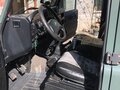 2011 Land Rover Defender 110 I Рестайлинг, зелёный, 2500000 рублей - вид 4