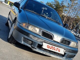 2003 Mitsubishi Carisma I Рестайлинг, зелёный, 400000 рублей, вид 1