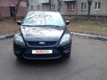 2010 Ford Focus II Рестайлинг, чёрный, 530000 рублей - вид 1