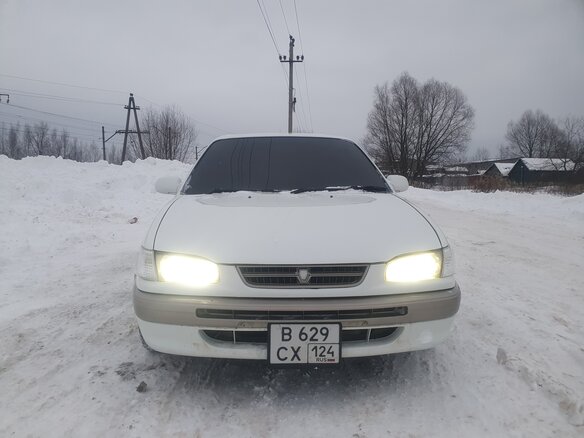 1997 Toyota Corolla VII (E100), белый, 350000 рублей - вид 1