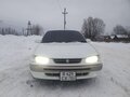 1997 Toyota Corolla VII (E100), белый, 350000 рублей - вид 1