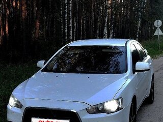 2011 Mitsubishi Lancer X Рестайлинг, белый, 620000 рублей, вид 3