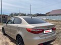 2013 Kia Rio 5-speed III, бежевый, 550000 рублей - вид 7