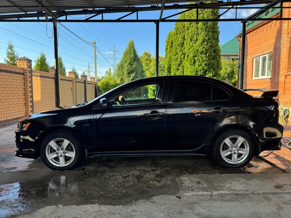 2008 Mitsubishi Lancer X, чёрный, 755000 рублей - вид 3