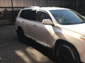 2012 Toyota Highlander II (XU40) Рестайлинг, белый, 1700000 рублей - вид 1