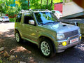 2004 Mitsubishi Pajero Mini II, серебристый - вид 1