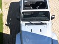 2024 Jeep Wrangler 4xe IV (JL) Рестайлинг, серебристый, 4850000 рублей - вид 5