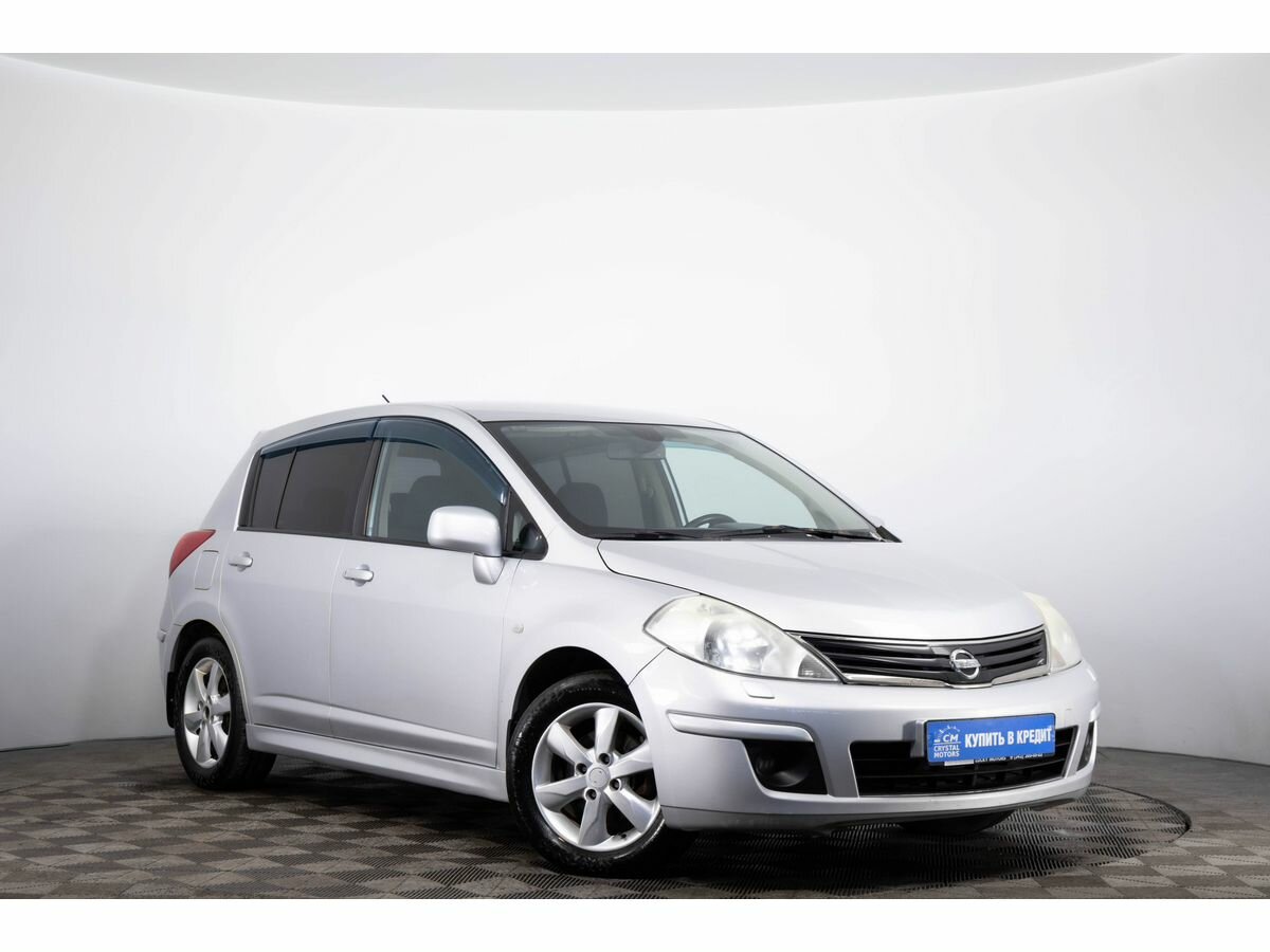 Открыть фотографии: Nissan Tiida I Рестайлинг