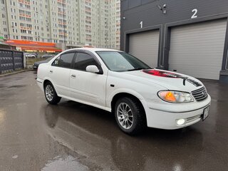 2003 Nissan Bluebird Sylphy I (G10), белый, 450000 рублей, вид 2