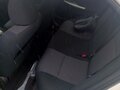 2012 Toyota Corolla X (E140, E150) Рестайлинг, белый, 1350000 рублей - вид 6