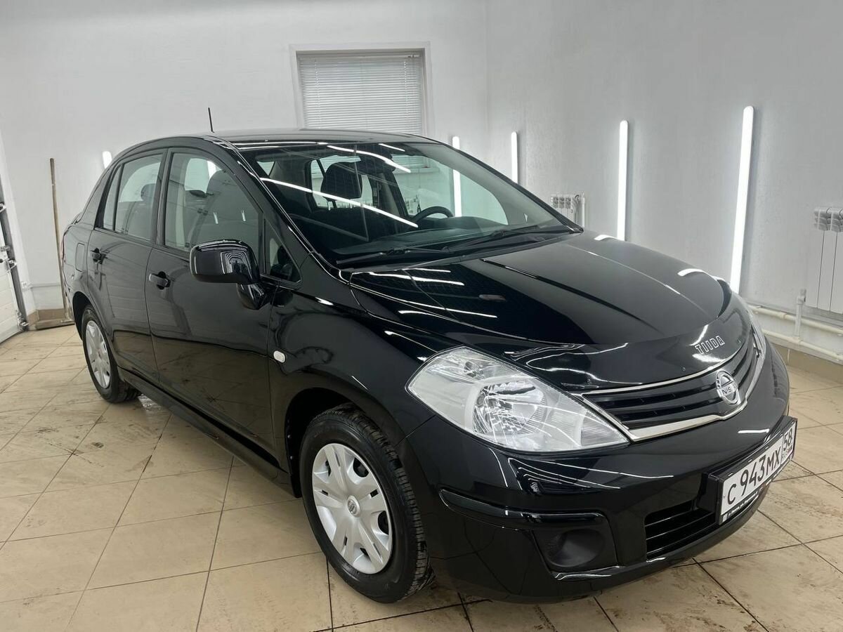 Открыть фотографии: Nissan Tiida I Рестайлинг