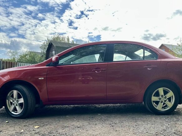 2008 Mitsubishi Lancer X, красный - вид 10