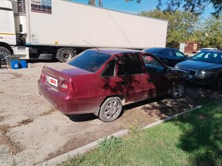 2010 Daewoo Nexia I Рестайлинг, пурпурный, 285000 рублей, вид 2