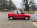 2012 Skoda Fabia II Рестайлинг, пурпурный, 426265 рублей