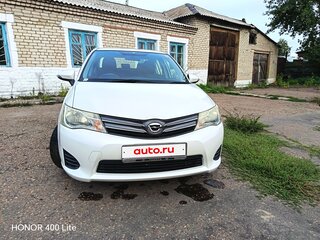2012 Toyota Corolla Axio XI (E160, E170, E180), белый, 1350000 рублей, вид 1