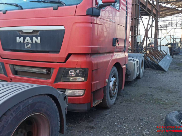 2012 MAN TGX, красный, 2755000 рублей - вид 1