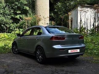 2012 Mitsubishi Lancer X Рестайлинг, серебристый, 700000 рублей, вид 2