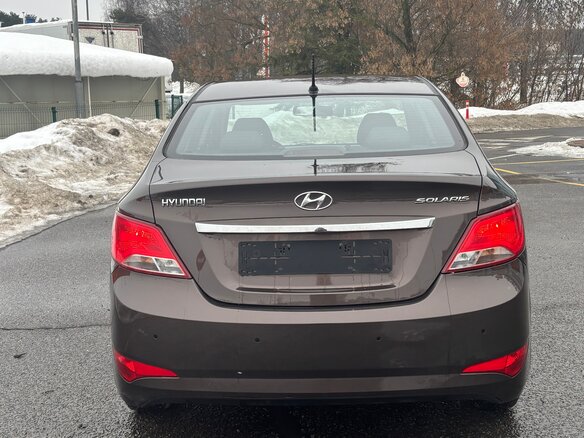 2014 Hyundai Solaris I Рестайлинг, коричневый, 950000 рублей - вид 3