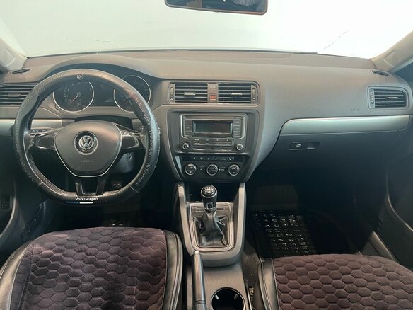 2016 Volkswagen Jetta VI Рестайлинг, коричневый - вид 9