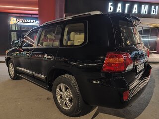 2012 Toyota Land Cruiser 200 Series Рестайлинг 1, чёрный, 5700000 рублей, вид 4