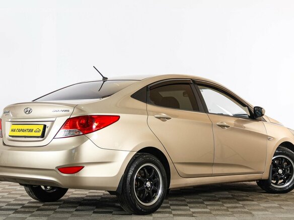 2012 Hyundai Solaris I, золотистый, 869000 рублей - вид 5