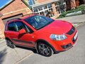 2012 Suzuki SX4 I (Classic) Рестайлинг, красный, 1037000 рублей - вид 1