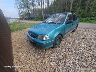 2001 Suzuki Swift II Рестайлинг, зелёный, 60000 рублей, вид 1