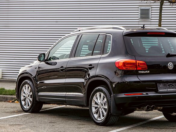 2014 Volkswagen Tiguan I Рестайлинг, чёрный, 1095000 рублей - вид 8