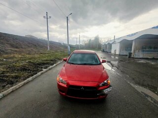 2010 Mitsubishi Lancer X, красный, 535000 рублей, вид 1