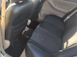 2002 Toyota Corolla IX (E120, E130), белый, 565000 рублей, вид 5