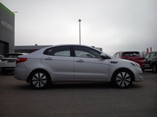 2012 Kia Rio 4-speed III, серебристый, 900000 рублей, вид 4