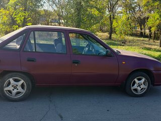 2011 Daewoo Nexia I Рестайлинг, пурпурный, 295000 рублей, вид 3