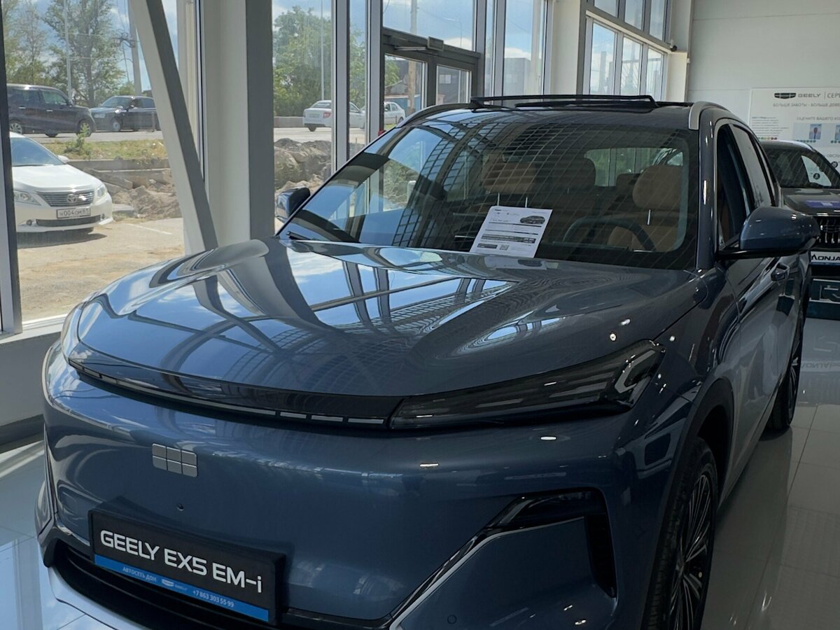 Открыть фотографии: Geely EX5 Гибрид