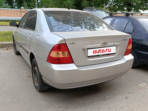 2003 Toyota Corolla IX (E120, E130), серебристый - вид 2