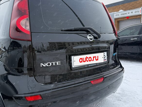 2011 Nissan Note I Рестайлинг, чёрный, 1050000 рублей - вид 2