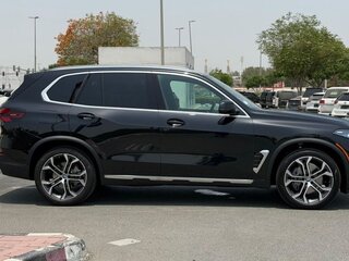 2026 BMW X5 40i IV (G05/G18) Рестайлинг, чёрный, 11744100 рублей, вид 5