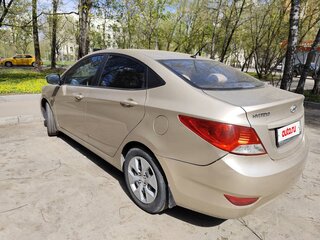 2014 Hyundai Solaris I, золотистый, 725000 рублей, вид 5