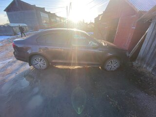 2016 Volkswagen Jetta VI Рестайлинг, коричневый, 850000 рублей, вид 3