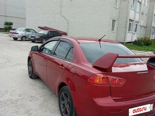 2008 Mitsubishi Lancer X, красный, 660000 рублей, вид 4