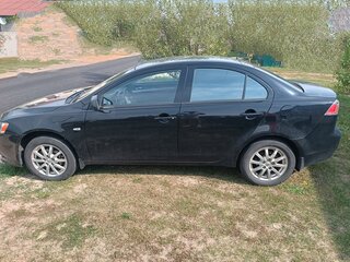 2011 Mitsubishi Lancer X Рестайлинг, чёрный, 700000 рублей, вид 4