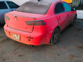 2009 Mitsubishi Lancer X, красный, 820000 рублей - вид 2