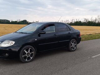2006 Toyota Corolla IX (E120, E130) Рестайлинг, чёрный, 650000 рублей, вид 2