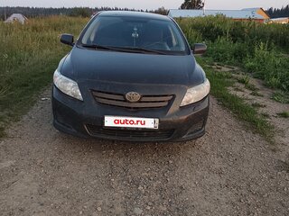 2010 Toyota Corolla X (E140, E150), чёрный, 450000 рублей, вид 2