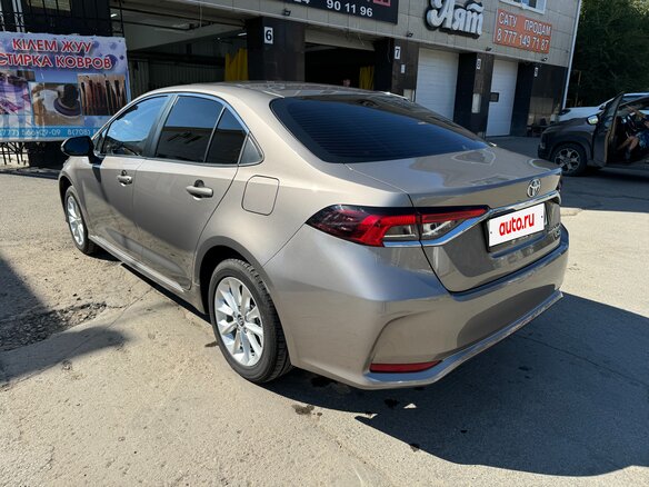 2022 Toyota Corolla XII (E210), коричневый, 1790000 рублей - вид 6