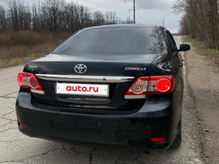 2011 Toyota Corolla X (E140, E150) Рестайлинг, чёрный, 1160000 рублей, вид 2