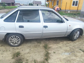 2012 Daewoo Nexia I Рестайлинг, серебристый, 200000 рублей, вид 5