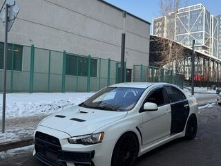 2009 Mitsubishi Lancer Evolution X, белый, 3000000 рублей, вид 1