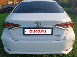 2021 Toyota Corolla XII (E210), белый, 1850000 рублей, вид 4