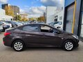 2016 Hyundai Solaris I Рестайлинг, коричневый, 955000 рублей - вид 3