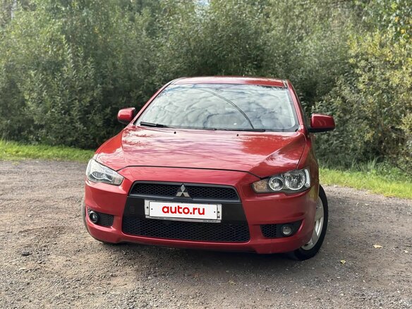 2008 Mitsubishi Lancer X, красный - вид 4